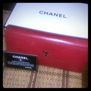 Authentic Chanel camellia embossed flap wallet